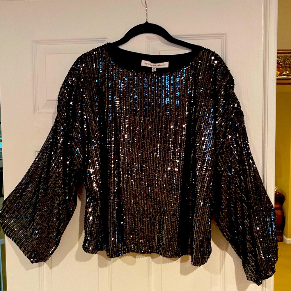 Gorgeous black Sequined top made by “cupcakes and cashmere” Size M. Never worn.